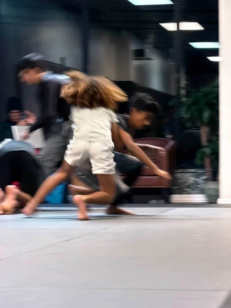 Kids running and warming up at Lucid Jiu Jitsu children's class in Hewlett NY