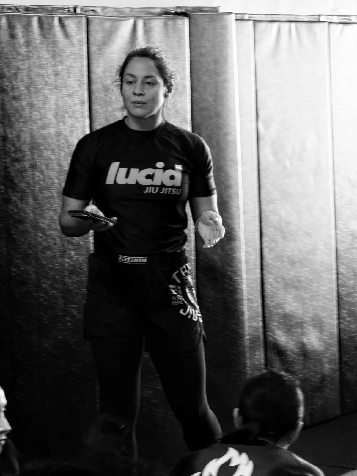 Women's jiu jitsu instructor leading a class at Lucid Jiu Jitsu in Hewlett NY
